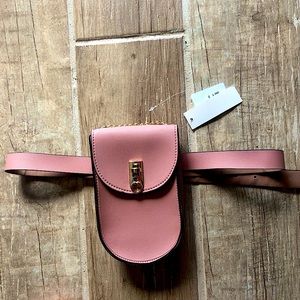 Super cute, belt with small bag attached !!